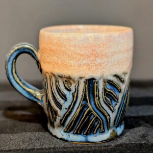 Blue and yellow espresso cup
